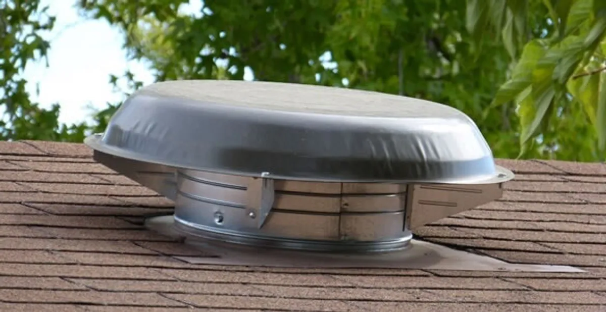 attic fan installation services with low-profile roof ventilation unit in Nashville, TN