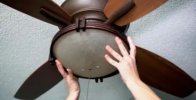 Ceiling fan repair and reinstallation on ceiling mount in Nashville, TN
