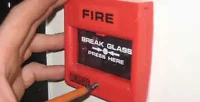 fire alarm installation service showing manual fire alarm pull station installed by licensed electricians in Nashville, TN