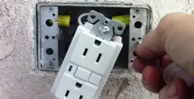 gfci circuits service showing installation of a ground fault circuit interrupter outlet by licensed electricians in Nashville, TN