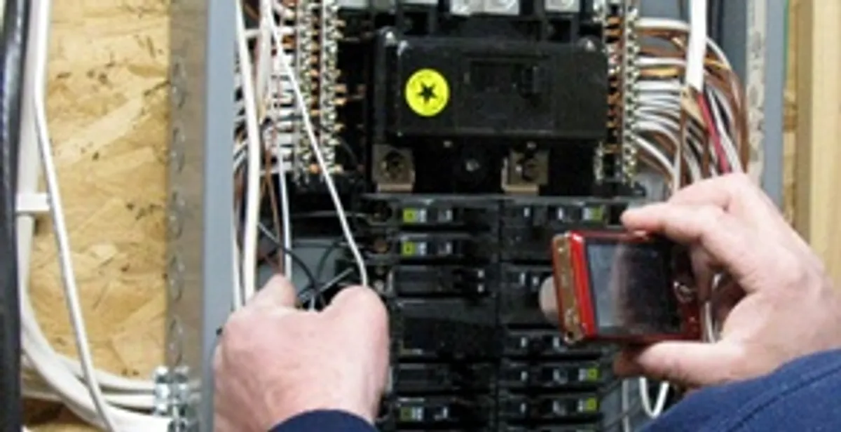 Home electrical inspection of circuit breaker panel by licensed electrician in Nashville, TN
