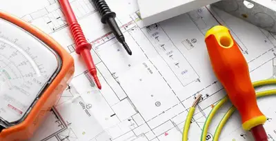licensed electrician planning and testing electrical systems using professional tools in Nashville, TN