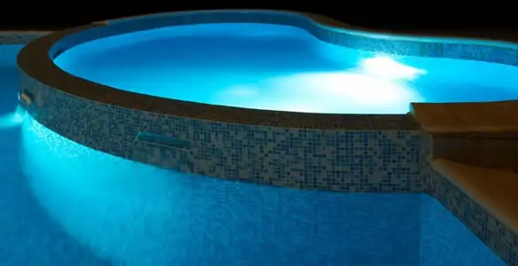 pool light installation and repair services highlighting illuminated pool interior lighting in Nashville, TN