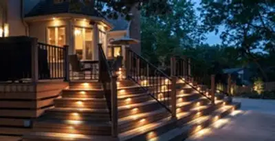 Residential electrician installing outdoor lighting for home safety in Nashville, TN