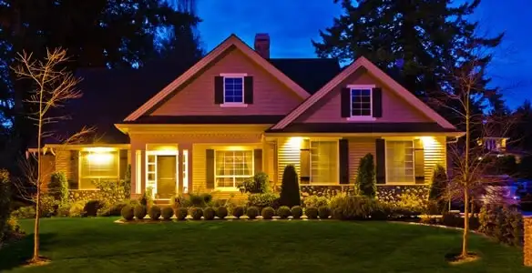 security light installation services illuminating a residential exterior at night in Nashville, TN