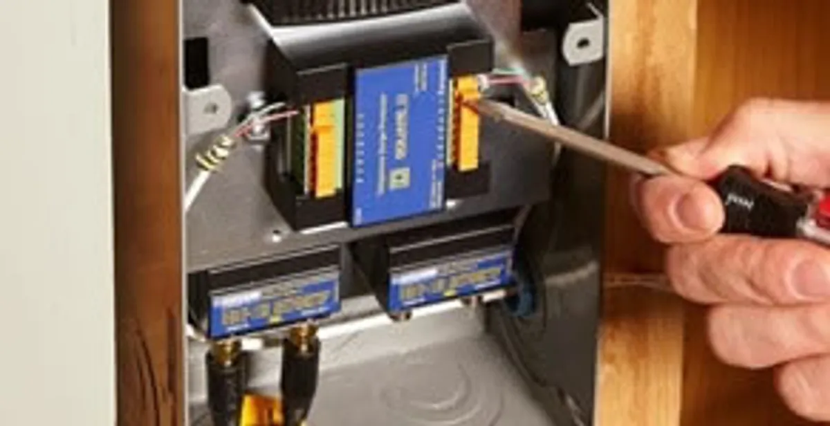 Whole home surge protection device being installed by a licensed electrician to protect electrical systems in Nashville, TN